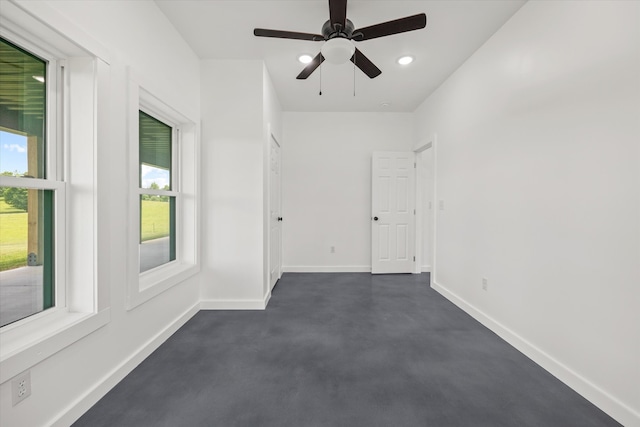 unfurnished room featuring ceiling fan