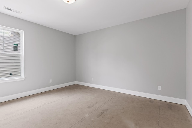 empty room with concrete floors