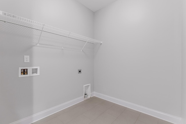 laundry room with hookup for an electric dryer and hookup for a washing machine