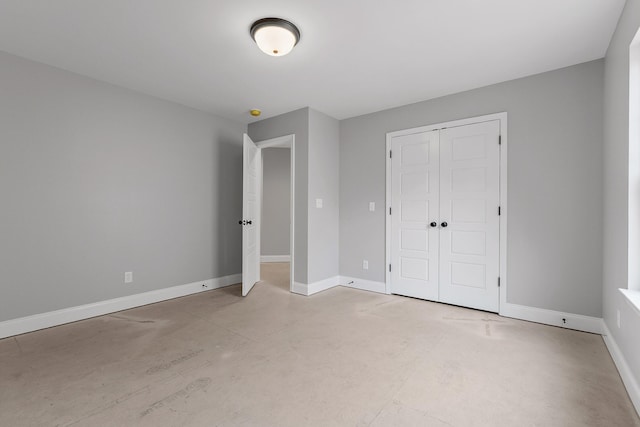 unfurnished bedroom with a closet