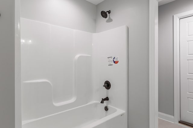 bathroom with shower / bathtub combination