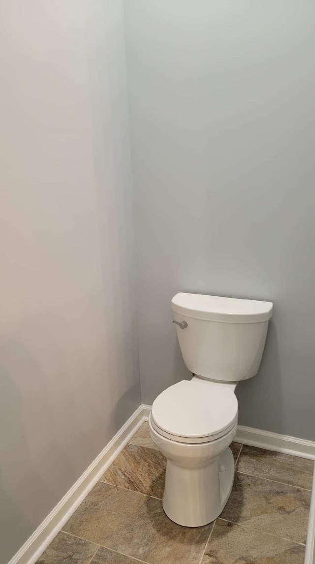 2175 Winsett Rd, Springville, TN 38256 - bathroom featuring baseboards, tile patterned floors, and toilet