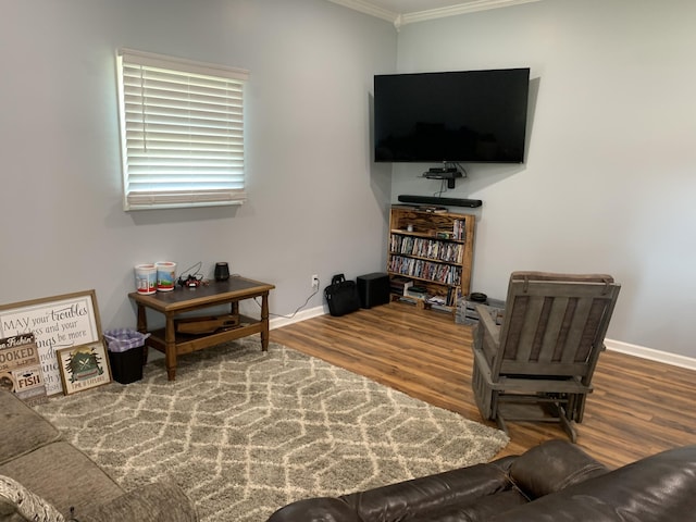2175 Winsett Rd, Springville, TN 38256 - living area featuring crown molding, baseboards, and wood finished floors