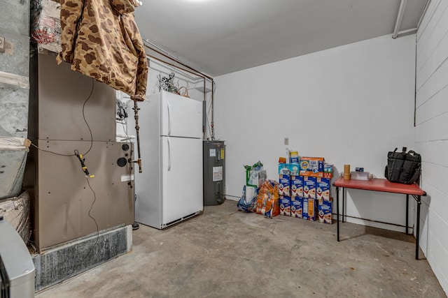 basement with water heater, heating unit, and white fridge