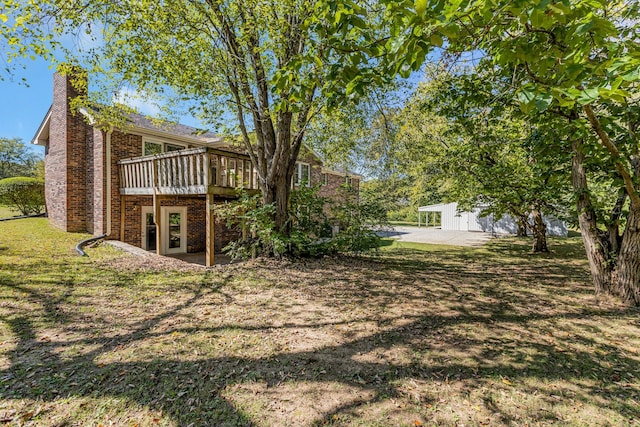 view of yard with a deck