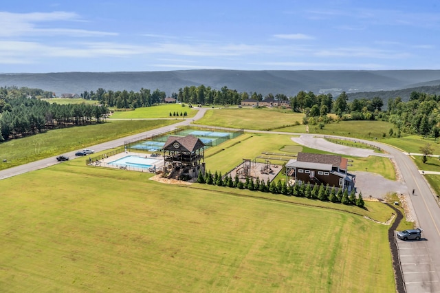 drone / aerial view featuring a mountain view and a rural view