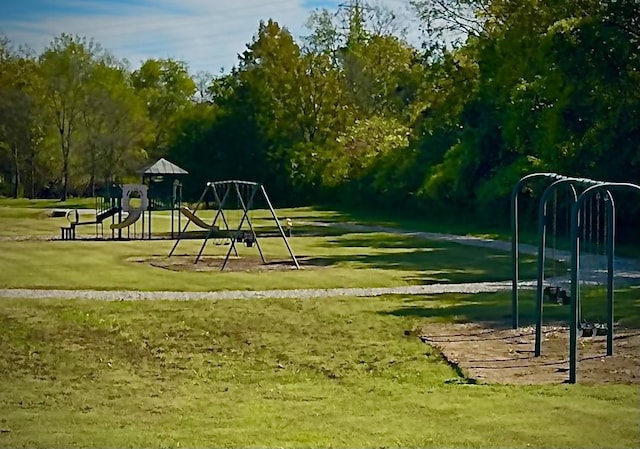 view of jungle gym with a yard