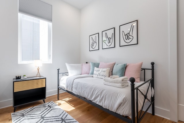 bedroom featuring wood-type flooring