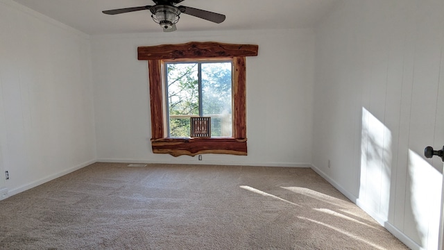 carpeted empty room with ceiling fan