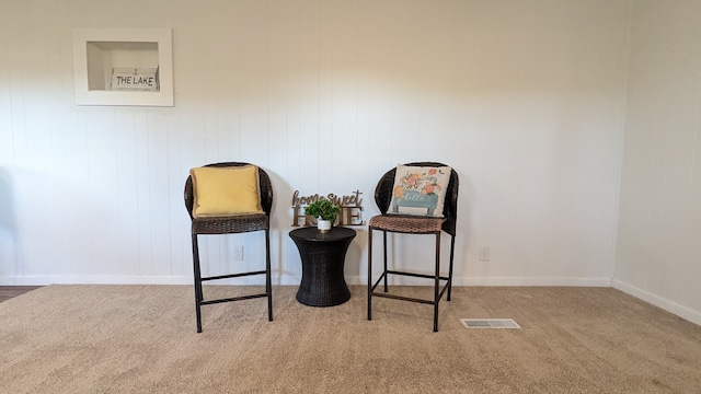 living area with carpet floors