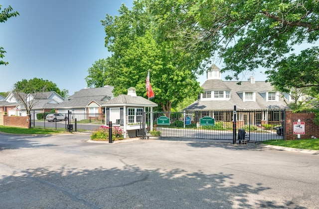view of front of house featuring a gate and fence