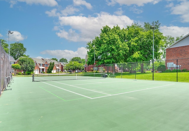 view of sport court with fence and community basketball court