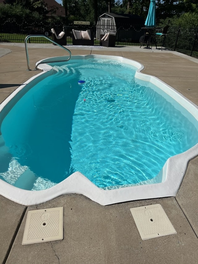 view of pool with a patio