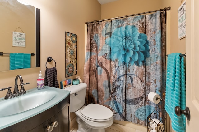 bathroom with toilet, tile patterned flooring, a shower with curtain, and vanity