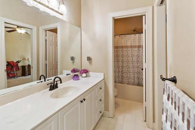 full bathroom with ceiling fan, toilet, vanity, and shower / bathtub combination with curtain