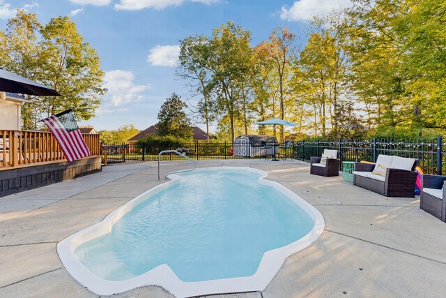 view of pool featuring a patio area and outdoor lounge area