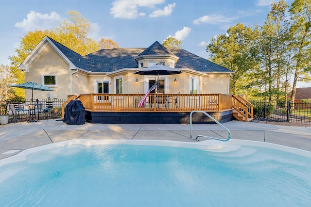 view of pool with a deck