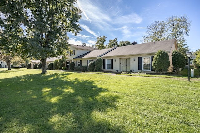 view of front of house with a front lawn