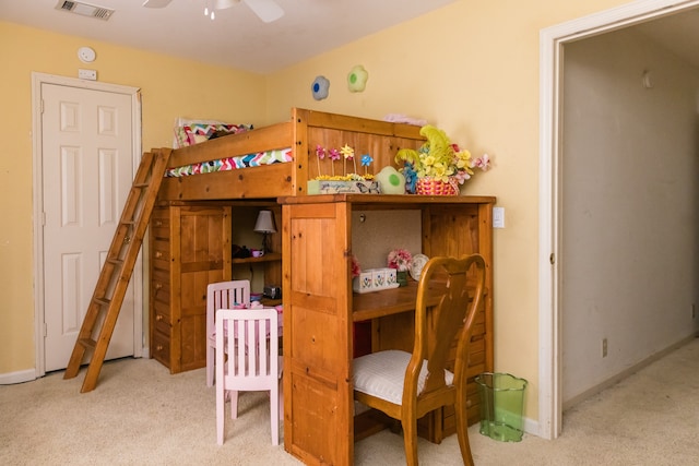 bedroom featuring ceiling fan and light carpet