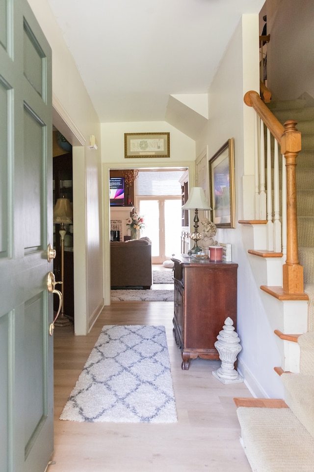 foyer with light hardwood / wood-style flooring