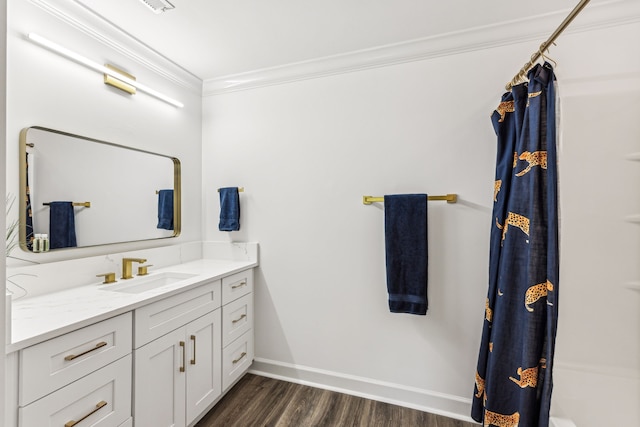 bathroom featuring vanity, crown molding, wood-type flooring, and shower / tub combo with curtain