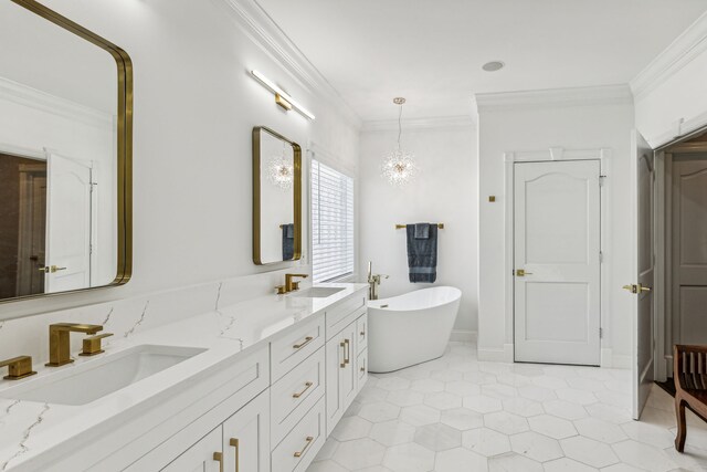 bathroom with vanity, a bathtub, ornamental molding, and tile patterned flooring