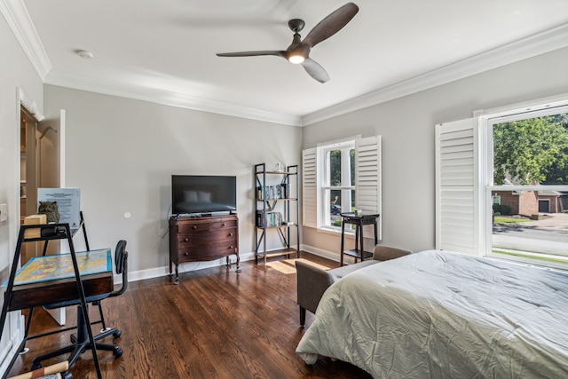 bedroom featuring dark wood-type flooring, ceiling fan, and crown molding