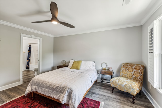 bedroom featuring ornamental molding, wood-type flooring, and ceiling fan