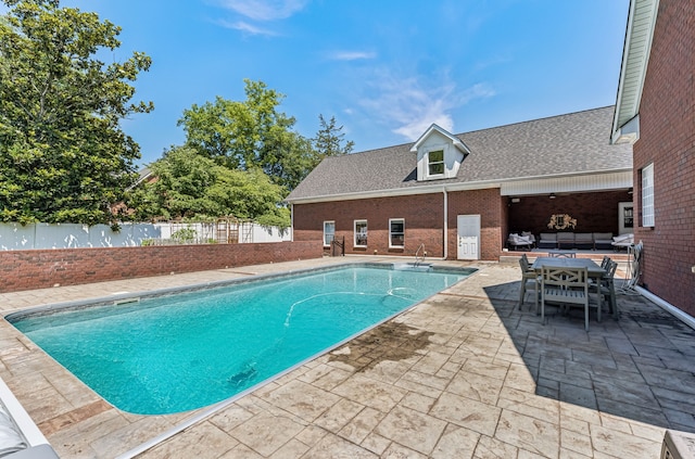 view of pool with a patio