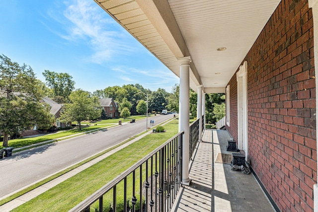 balcony featuring a porch