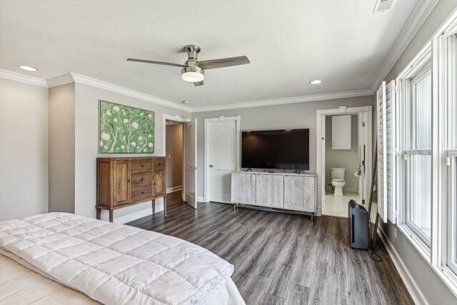 bedroom featuring ensuite bath, hardwood / wood-style floors, crown molding, and ceiling fan