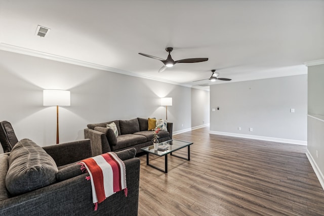 living room with crown molding, hardwood / wood-style flooring, and ceiling fan