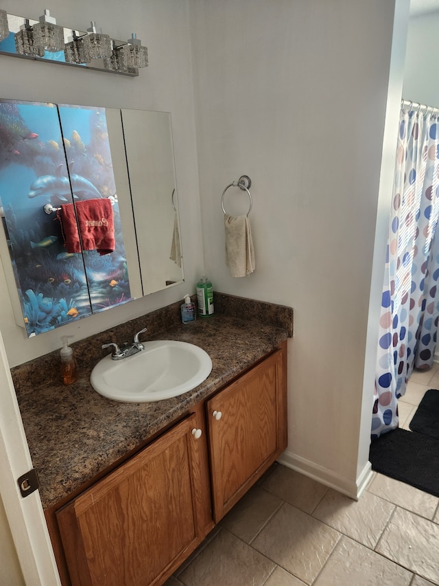 bathroom featuring vanity and curtained shower