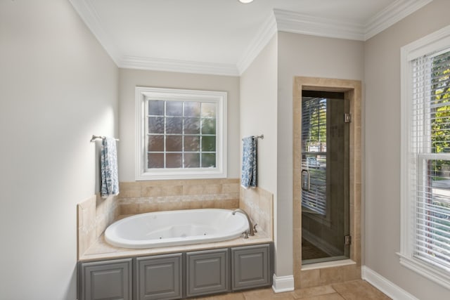 bathroom featuring crown molding, a healthy amount of sunlight, tile patterned floors, and separate shower and tub