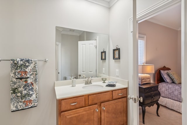 bathroom with vanity and crown molding