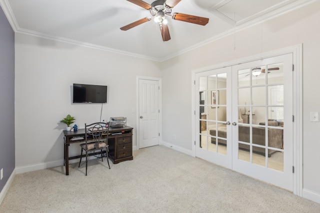 carpeted home office with crown molding, french doors, and ceiling fan