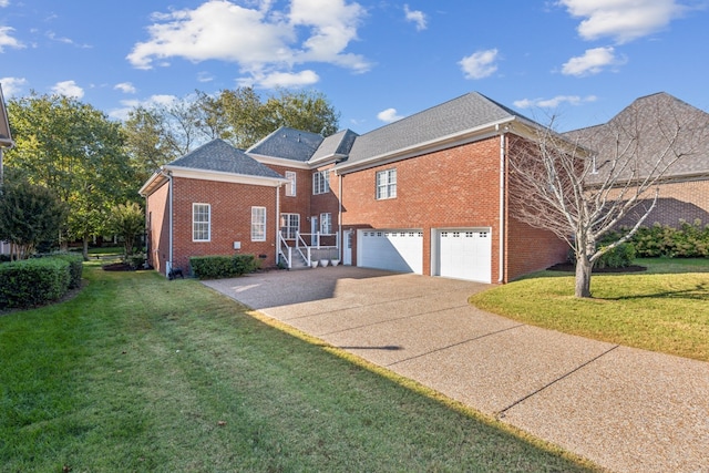 view of front of house with a front lawn and a garage