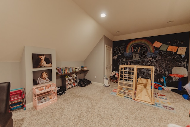 rec room featuring lofted ceiling and carpet floors