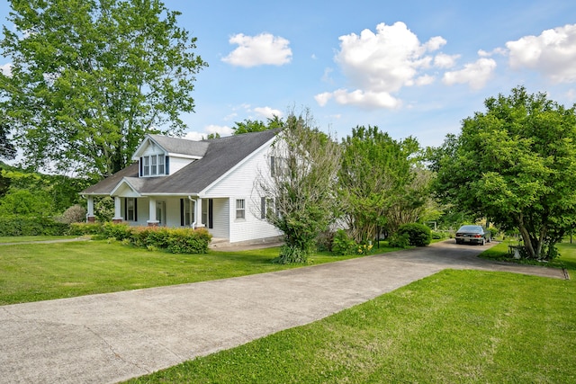 view of front of house featuring a porch and a front lawn