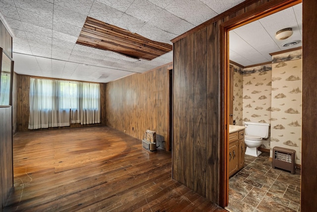 361 New Middleton Hwy, Gordonsville, TN 38563 - interior space with wooden walls and dark wood-style flooring