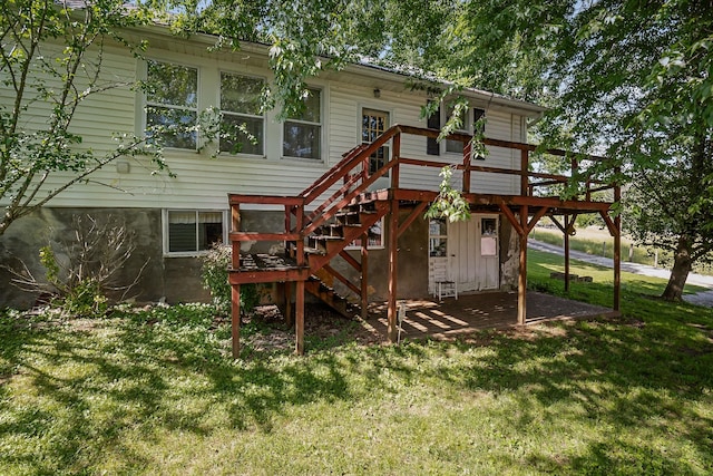 361 New Middleton Hwy, Gordonsville, TN 38563 - rear view of property featuring a lawn, a wooden deck, and stairs