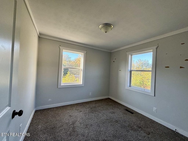 131 Christie Cir, Red Boiling Springs, TN 37150 - carpeted empty room with baseboards, ornamental molding, a textured ceiling, and visible vents