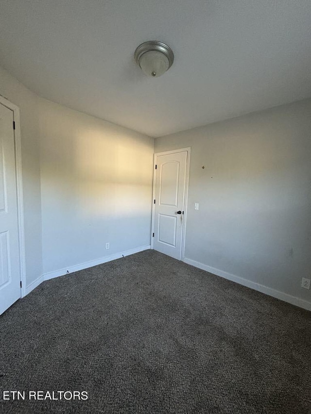 131 Christie Cir, Red Boiling Springs, TN 37150 - spare room featuring baseboards and carpet