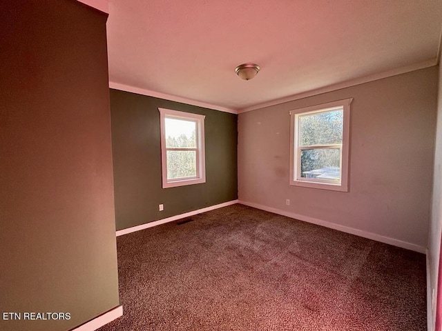 131 Christie Cir, Red Boiling Springs, TN 37150 - empty room with baseboards, dark carpet, and crown molding