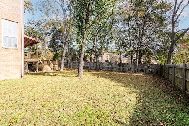 view of yard with a deck