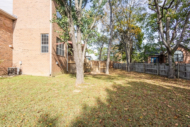 view of yard with central AC