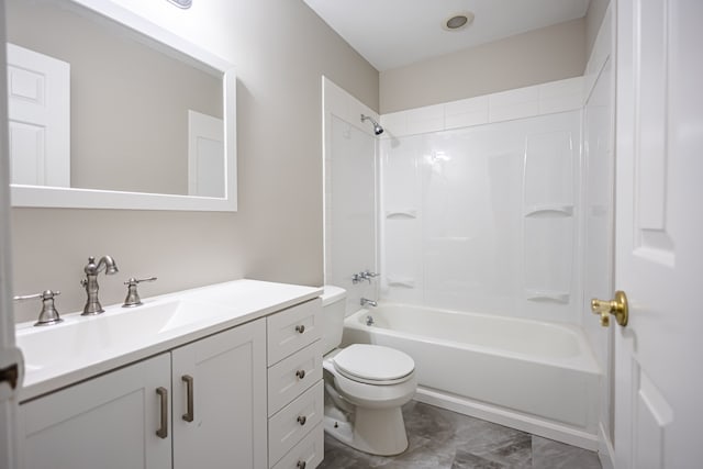 full bathroom featuring toilet, vanity, and  shower combination