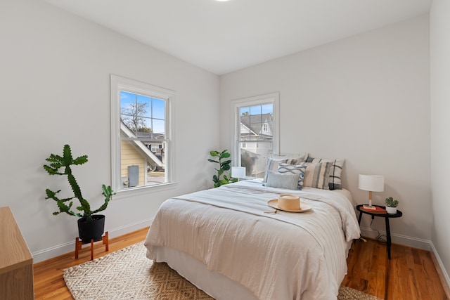 bedroom featuring wood-type flooring