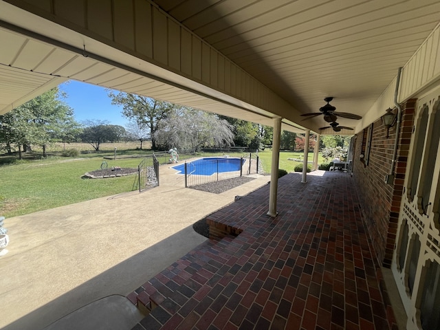 view of patio / terrace featuring ceiling fan