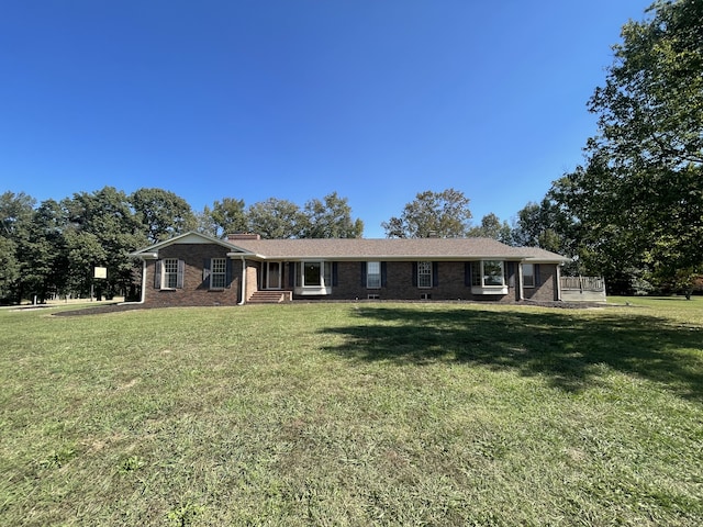 single story home with a front yard